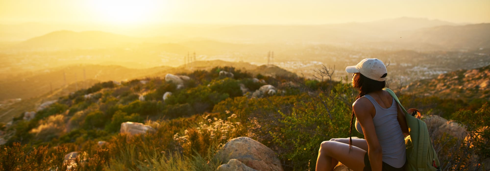 A woman enjoying the sunset near Silverhawk Self Storage in Murrieta, California