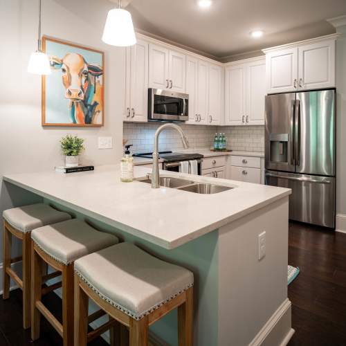 Beautiful kitchen with eat-in breakfast bars at 511 Queens in Charlotte, North Carolina