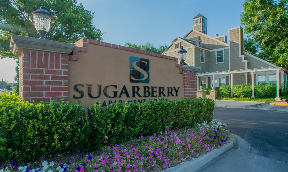 Exterior sign at Sugarberry Apartments in Tulsa, Oklahoma