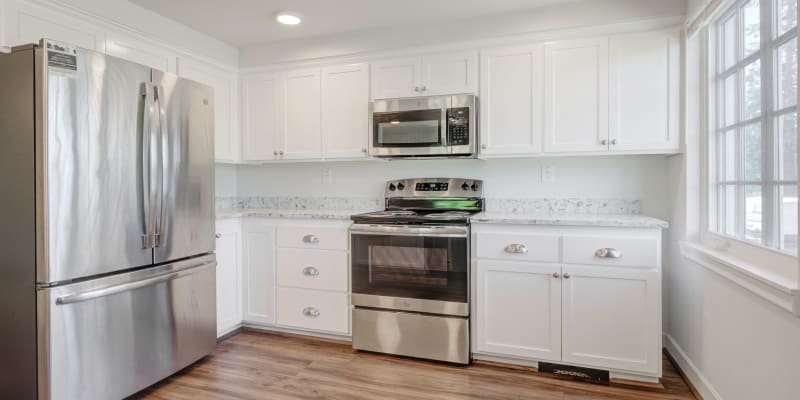 Kitchen with Stainless Steel Appliances at The Bricks in Joint Base Lewis McChord, Washington