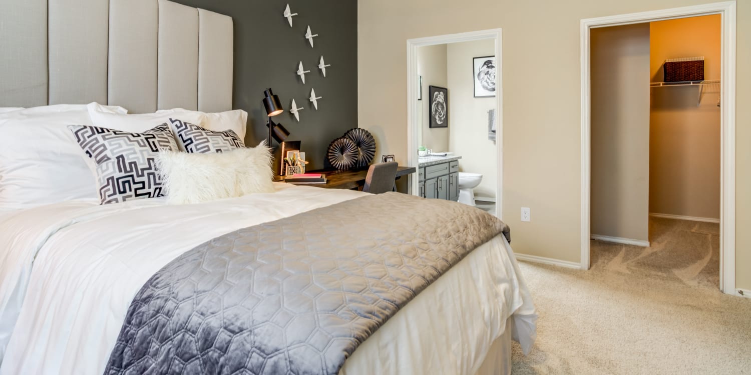 A cozy bedroom at Sola Westchase in Houston, Texas