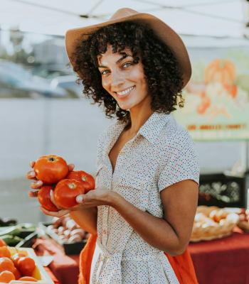 Resident shopping at the market near Centro Apartment Homes in Hillsboro, Oregon