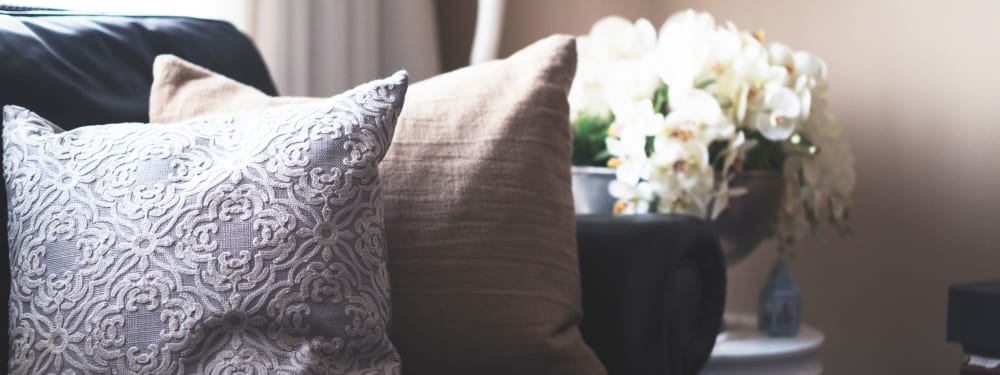 Comfortable pillows on a couch in an apartment at The Columbia at the Waterfront in Vancouver, Washington