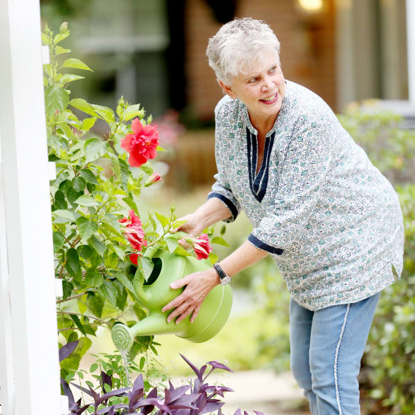 A resident in the garden at Providence Assisted Living.