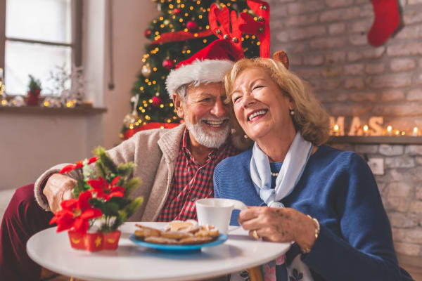 Senior couple laughing during Christmas
