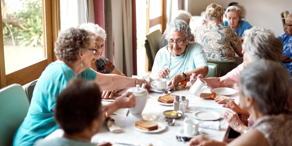 Residents having a meal at The Springs at Lancaster Village in Salem, Oregon