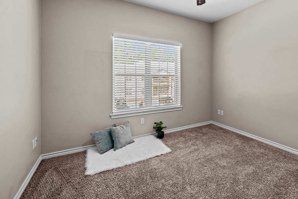 Bedroom with windows at Stonegate in Hallsville,Texas