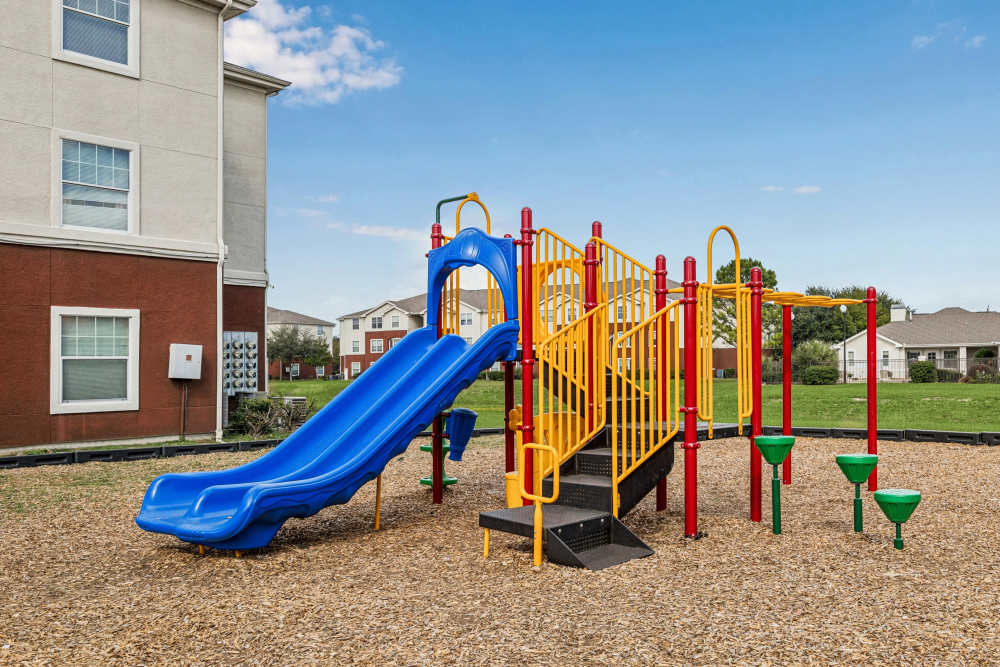 Play area with slides at Kimberly Pointe in Houston, Texas