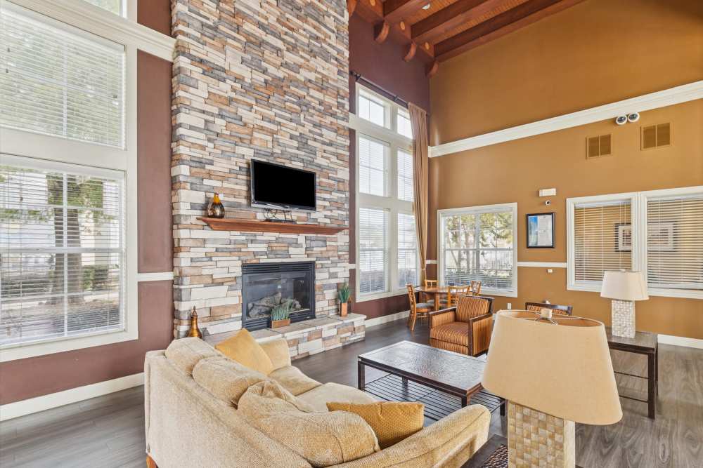 Community hall with couch and chairs at Costa Vizcaya in Houston, Texas