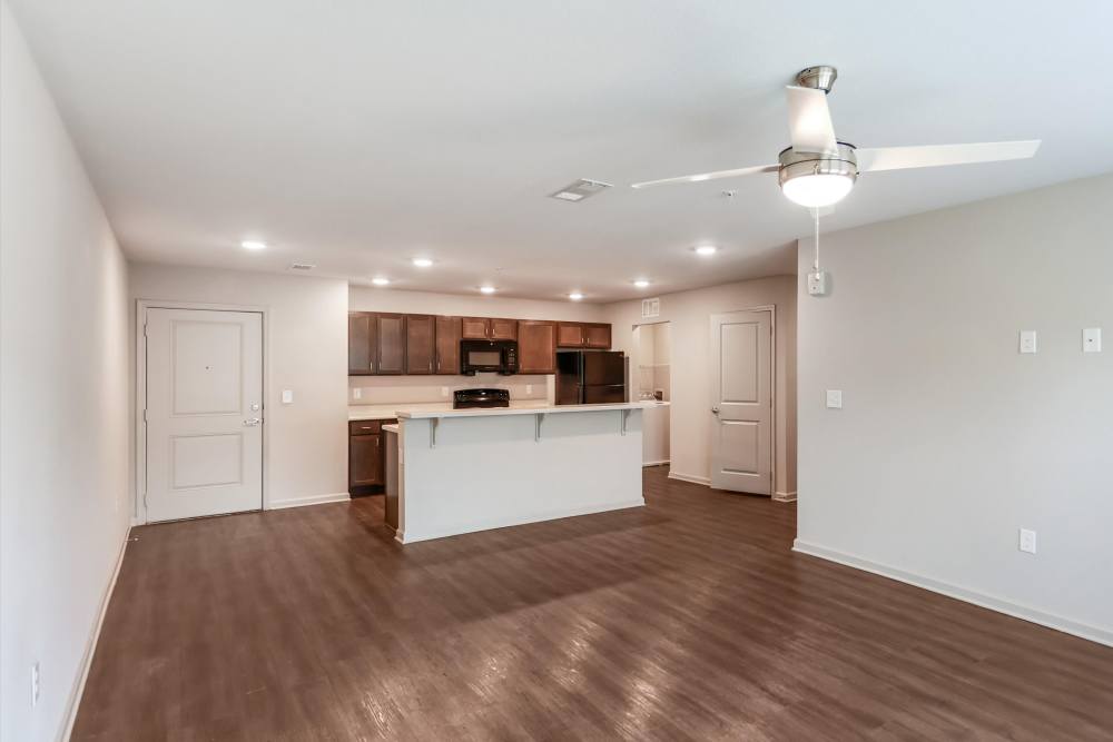 A wide view of kitchen room at Flats at Mount Zion in Stockbridge, Georgia