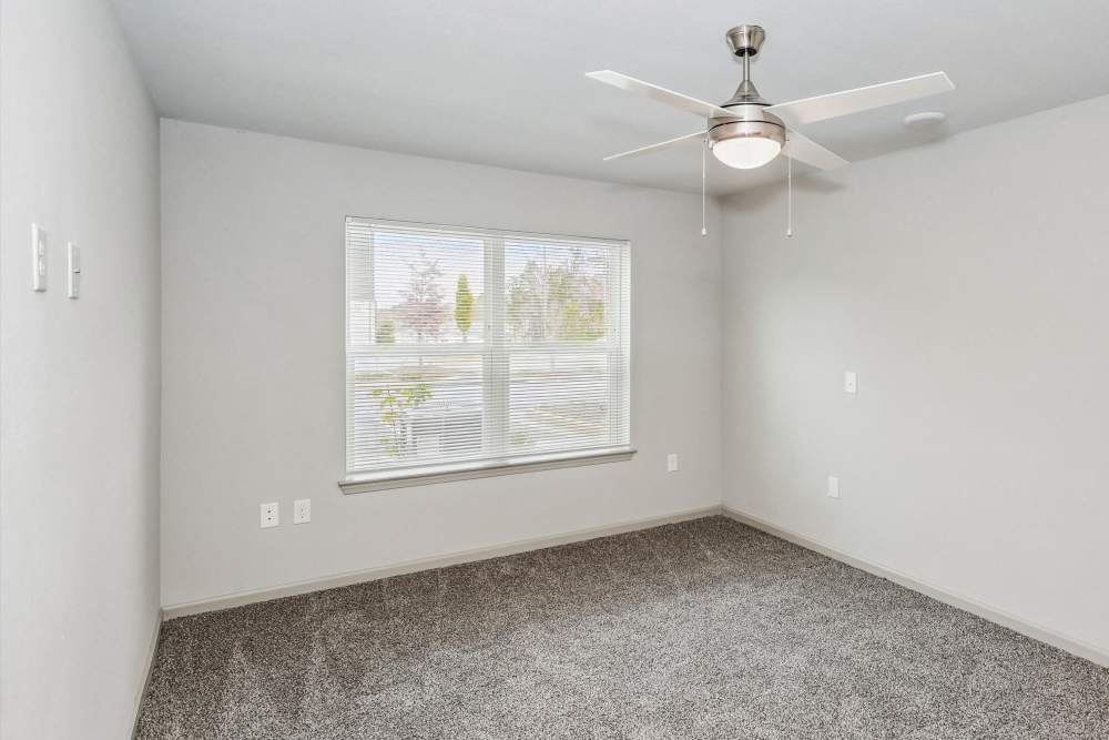 A view of well-lit bedroom at Flats at Mount Zion in Stockbridge, Georgia