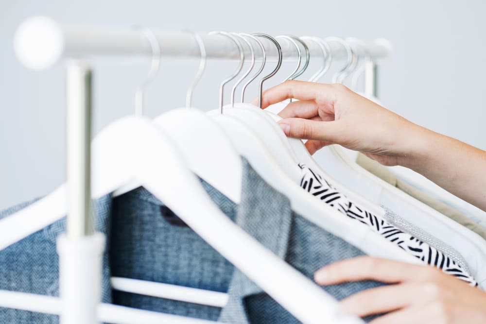Packing shirts for storage at Devon Self Storage in Fort Worth, Texas