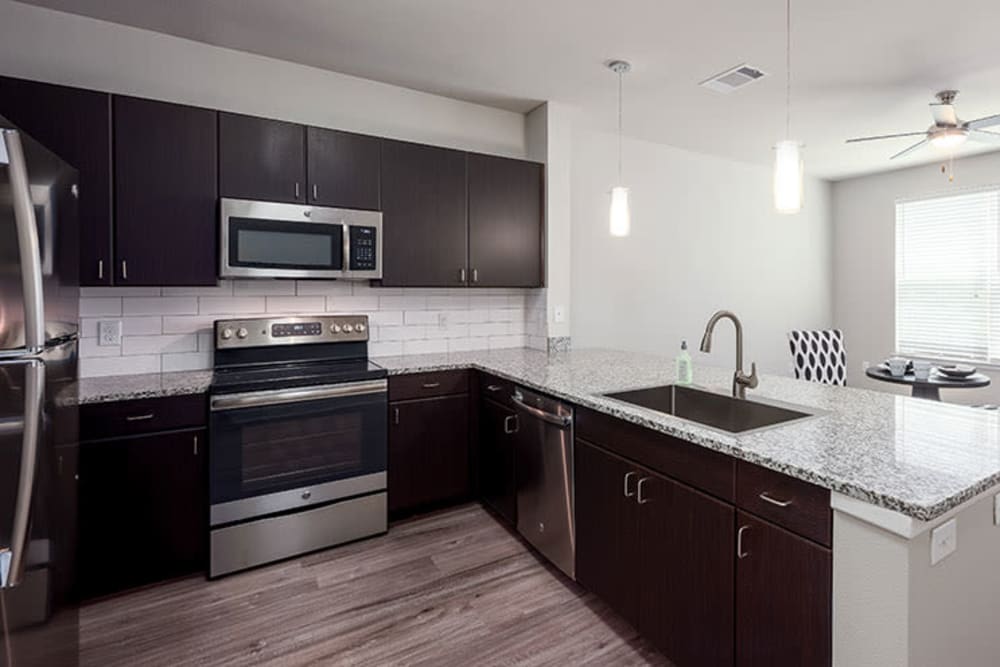 Modern kitchen in Addison Keller Springs model home in Addison