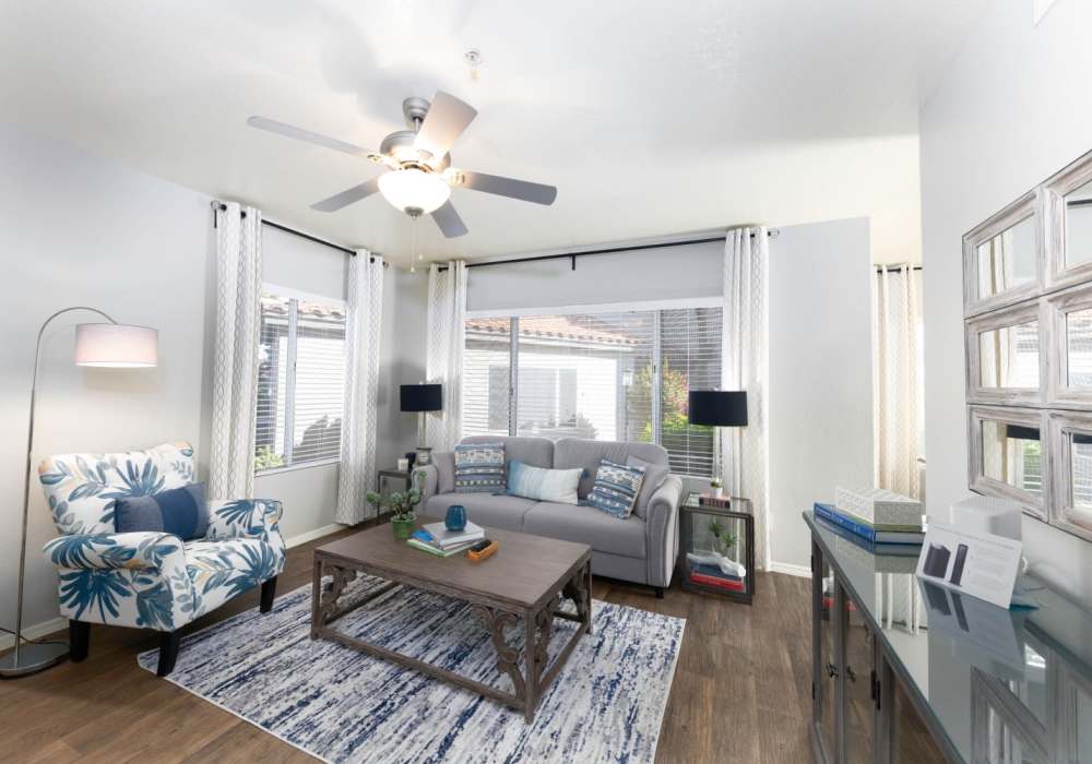 Living room with wood flooring at Alcove at the Islands in Gilbert, Arizona