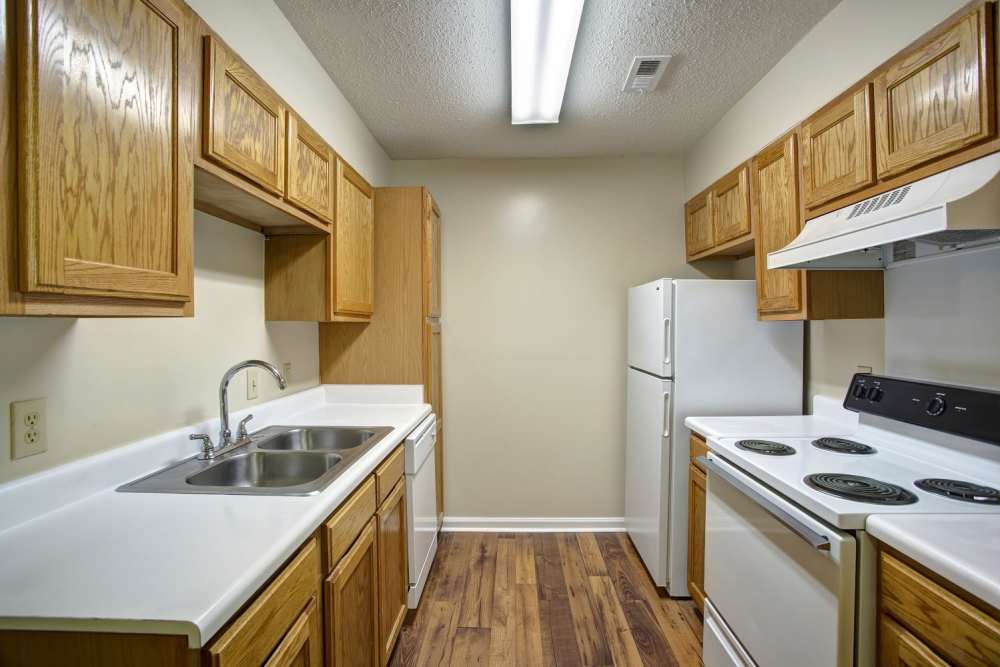 Kitchen with single sink and hood at Ridgewood at Greenbrier in Greenbrier, Tennessee