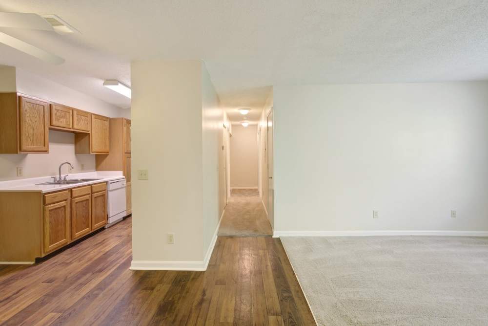 Unfunished dining area with ceiling fan and view to kitchen at Ridgewood at Greenbrier in Greenbrier, Tennessee
