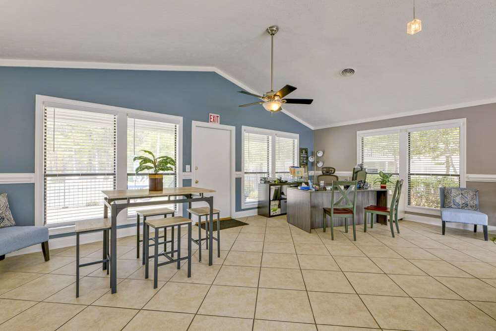 Community seating area with table and chairs at Landmark Flats in Fayetteville, North Carolina