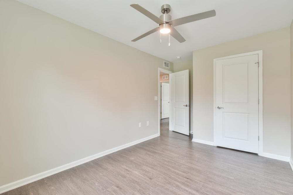 Bedroom wood style flooring at Canaan Crossing in Madison. GA