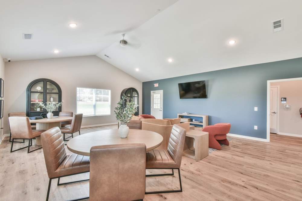 Dining space and lounge area at Carmichael Commons in Madison, Georgia