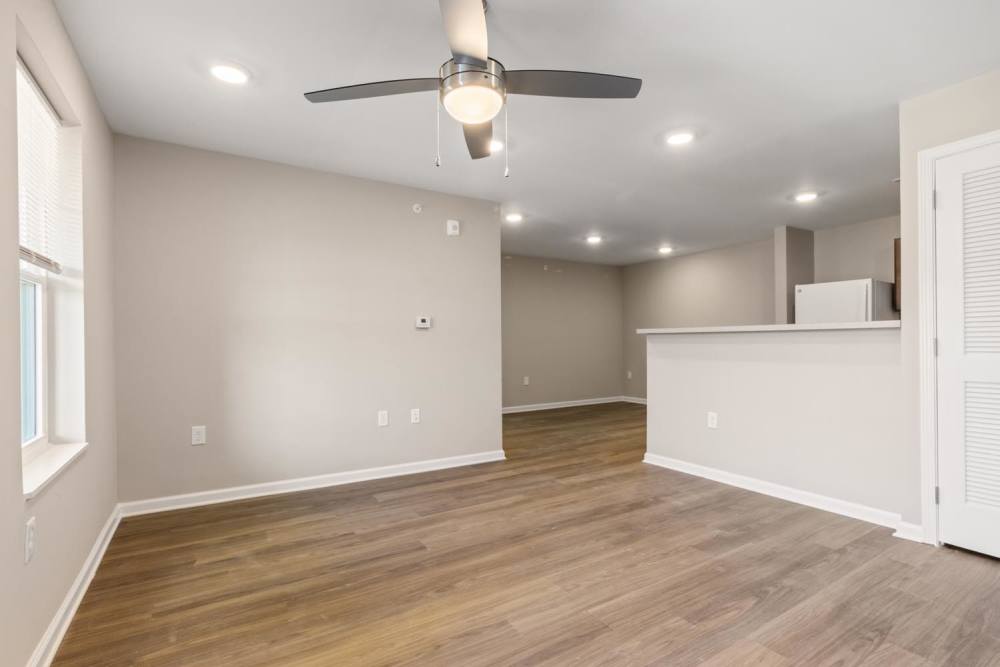 Living area with connecting kitchen at Rosemary Place in Freeport, Florida