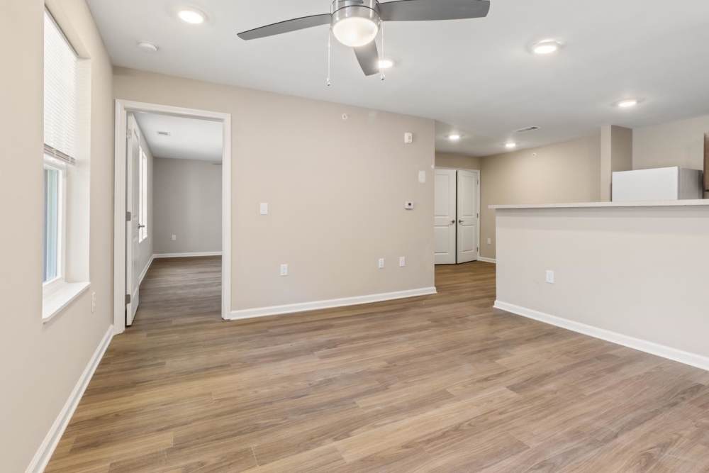 Living area with connecting kitchen at Rosemary Place in Freeport, Florida