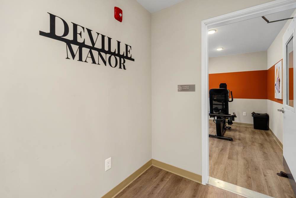 Entrance of community fitness center at Deville Manor in Oswego, Illinois