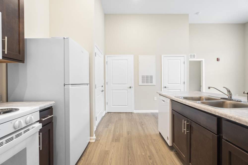 Fully equipped kitchen with appliances at Lambert Landing II in Chester, Virginia