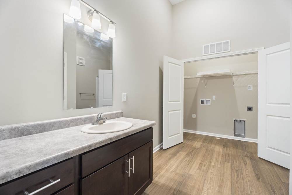 Spacious bathroom with sink and mirror at Lambert Landing II in Chester, Virginia