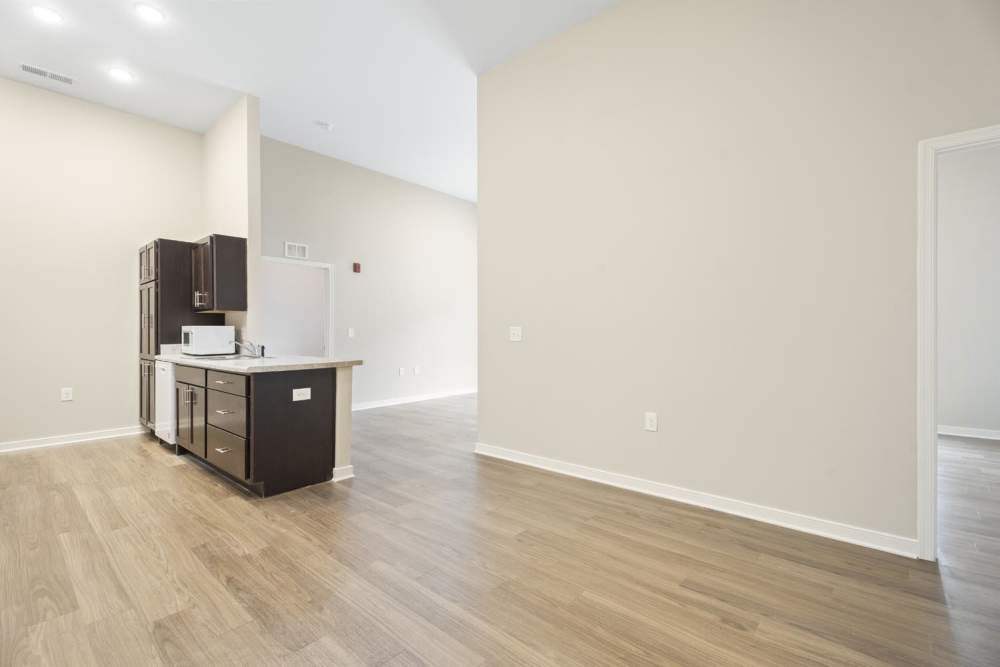 Kitchen with connecting living room at Lambert Landing II in Chester, Virginia