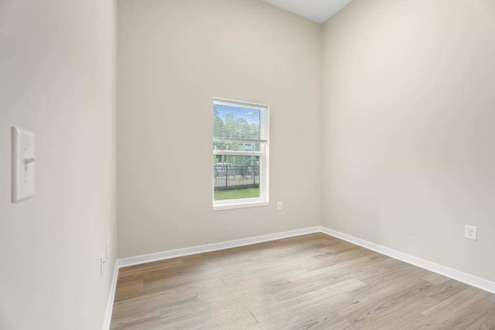 Bedroom with a window at Lambert Landing II in Chester, Virginia