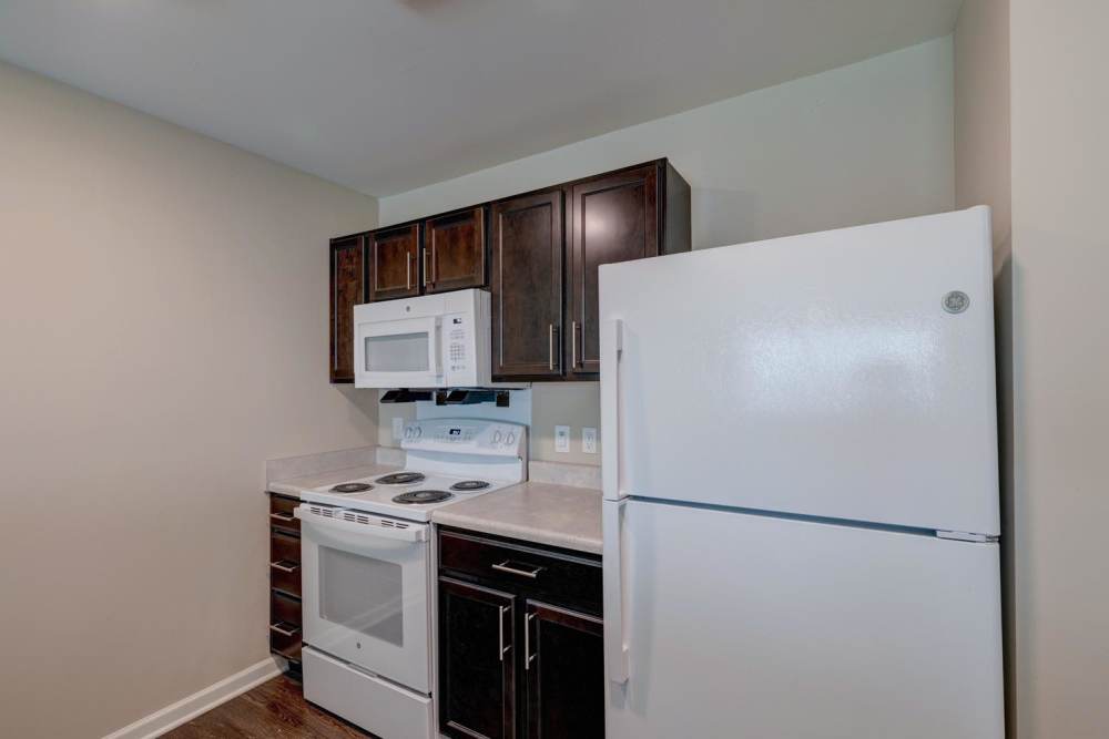 Kitchen with refrigerator at Harpers Crossing in Plainfield. IN