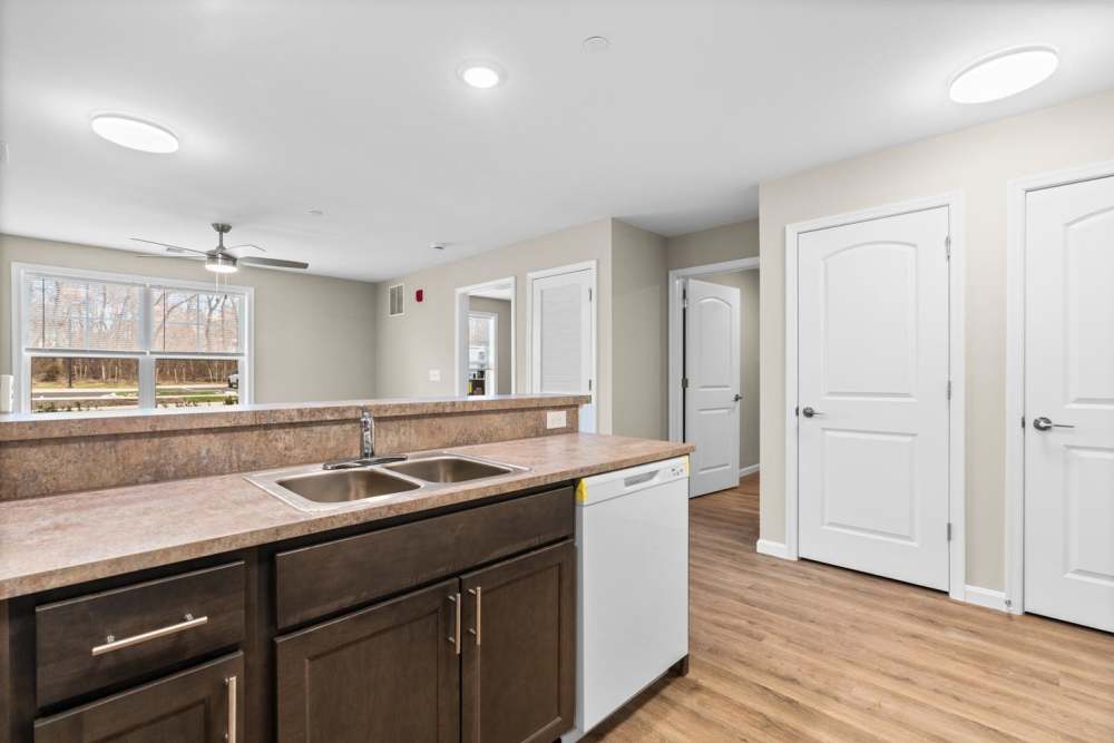 Kitchen leading into living space Millersview Crossing in Millersville, Maryland