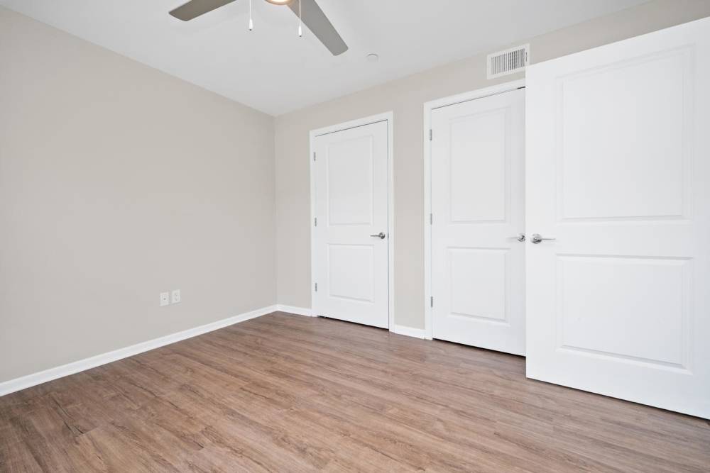 Unfurnished bedroom with wood flooring at Stockton Greene in Charleston. WV