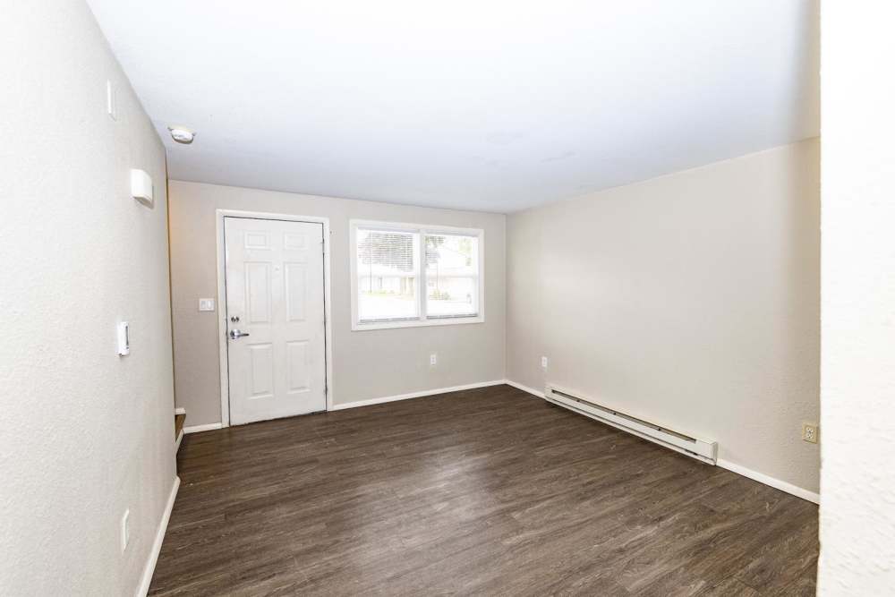 Well-lit living room at Taylor Crossing in Green Bay, Wisconsin