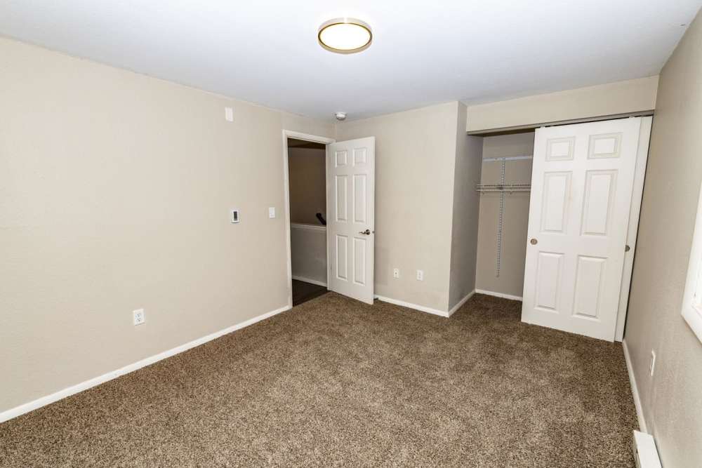 Bedroom with a closet at Taylor Crossing in Green Bay, Wisconsin