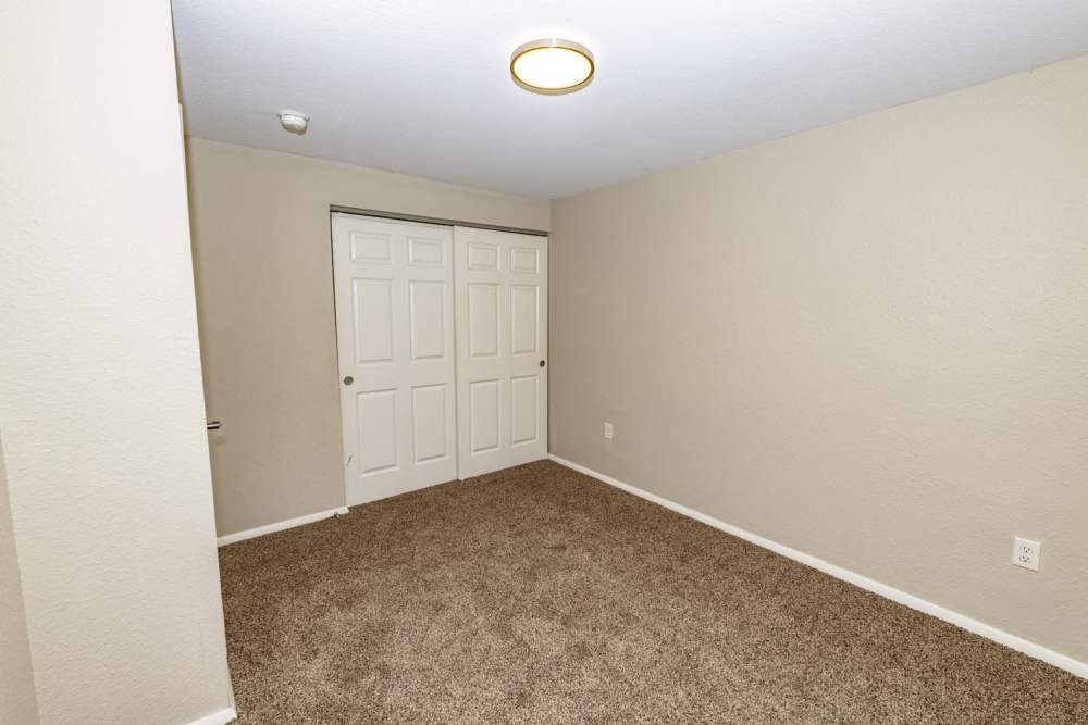 Bedroom with a walk-in closet at Taylor Crossing in Green Bay, Wisconsin