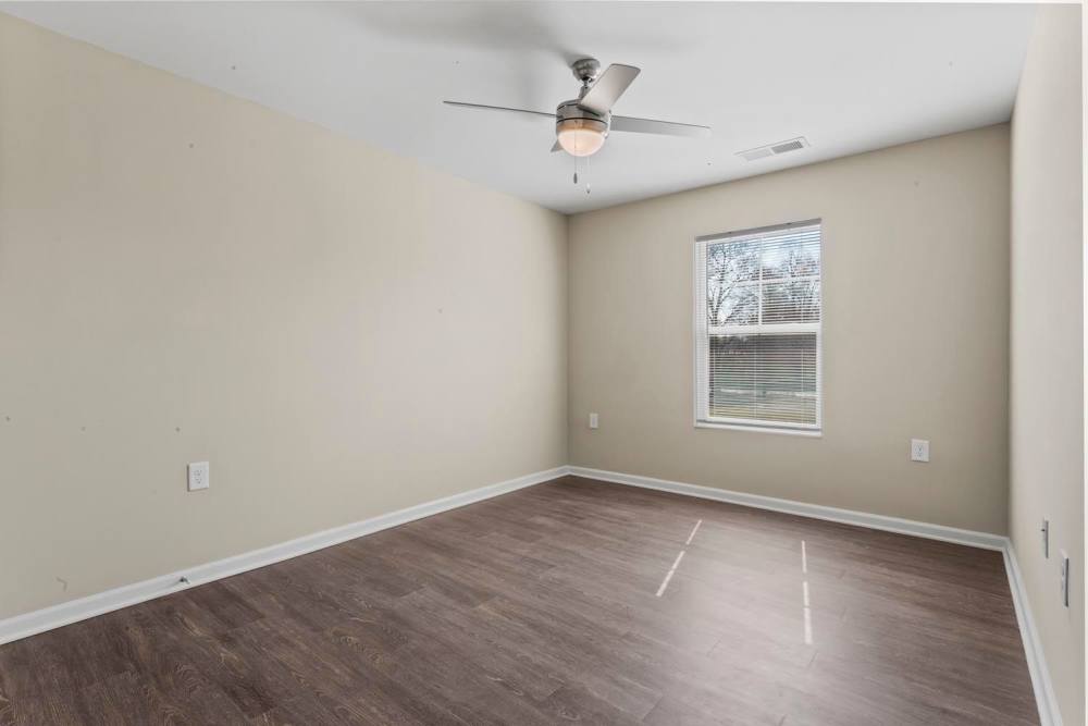 Unfurnished bedroom with wood flooring at Stanton Park Apartments in Atlanta. GA