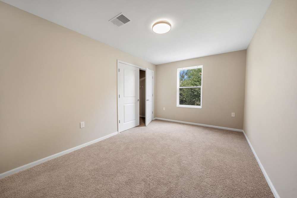 Bedroom with window at The Hamilton in Pontiac. MI