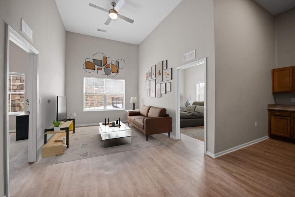 Living room with modern furniture at Washington Greene in Charleston, West Virginia