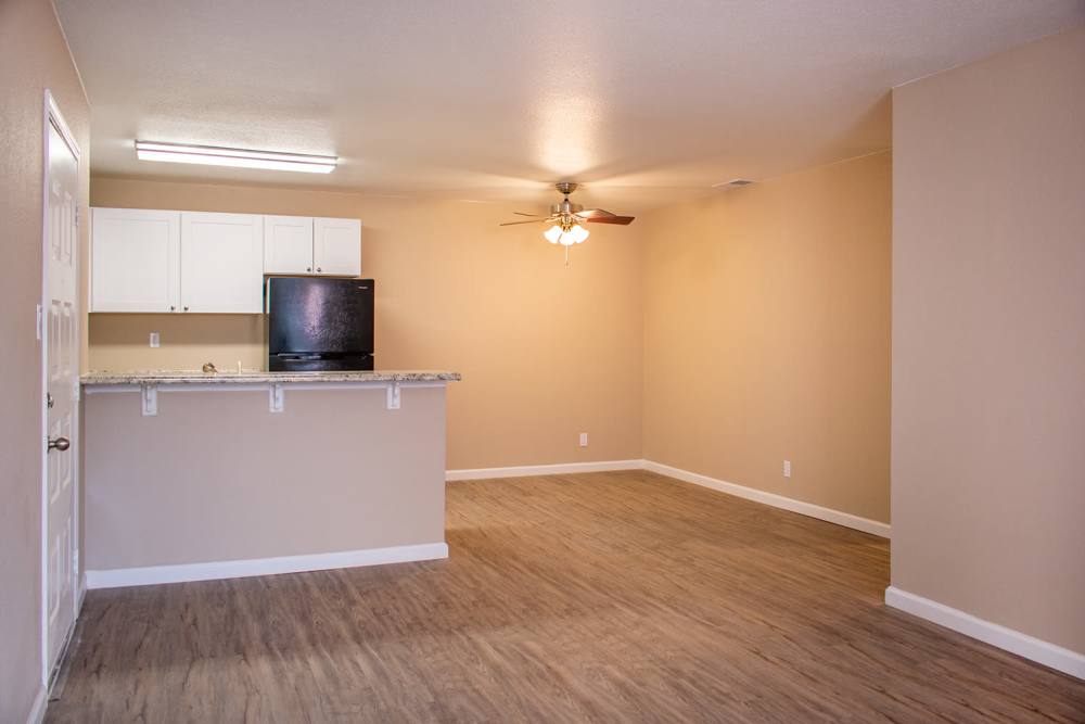 Unfurnished living room with access to dining area and kitchenat Lakeview in Reno, Nevada