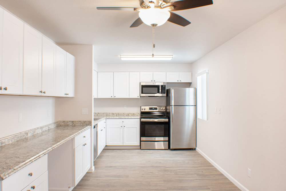 Overview of kitchen of an apartment at Sand Pebble and Spanish Oaks in Sparks, Nevada