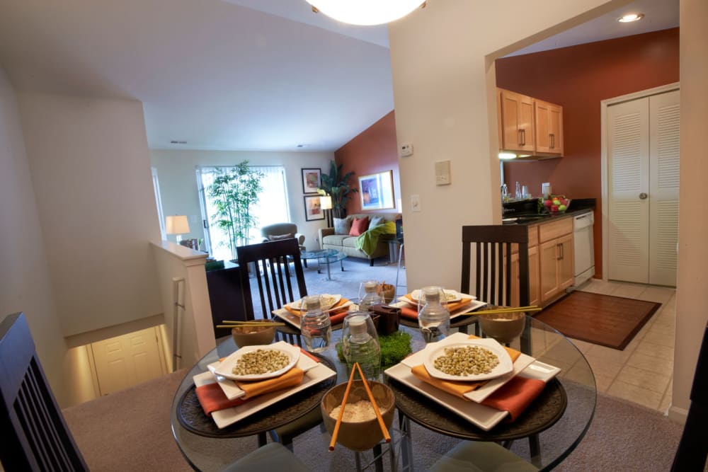 Dining room in an open layout apartment at Lakeside Terraces in Sterling Heights, Michigan