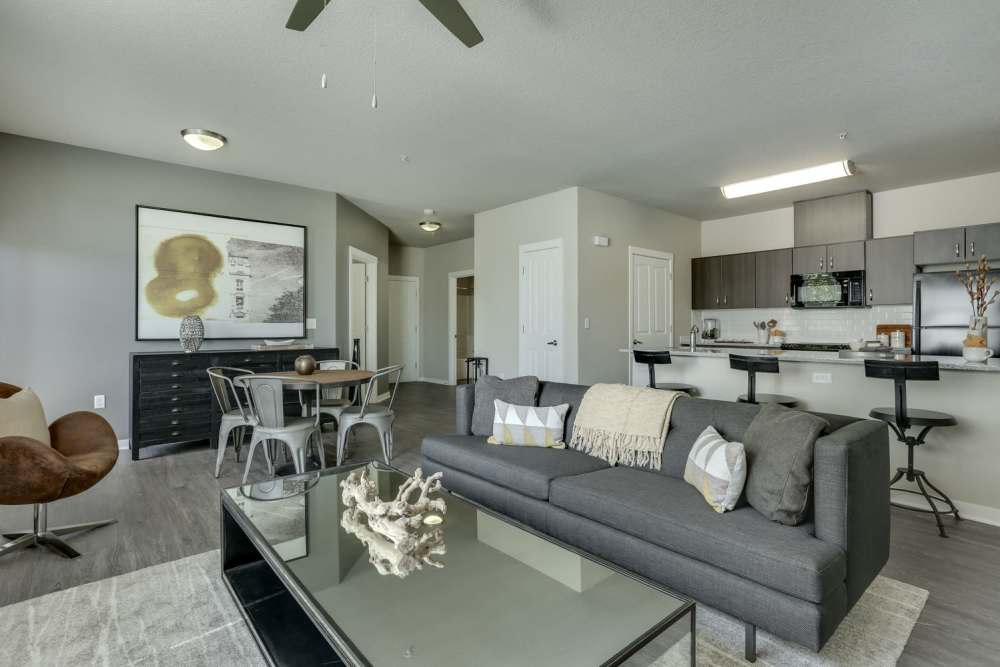 Open concept apartments, living room and kitchen view at Terrene at the Grove in Wilsonville, Oregon