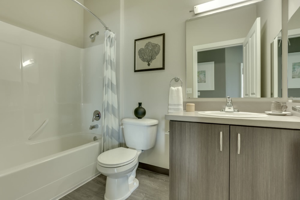 Bathroom with bathtub at Terrene at the Grove in Wilsonville, Oregon