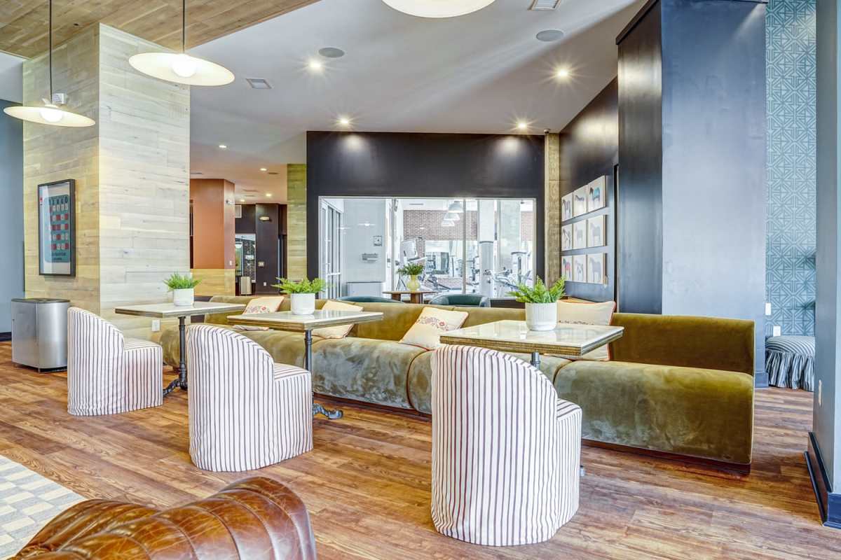 Spacious clubhouse with couch at The Nine in Louisville. KY