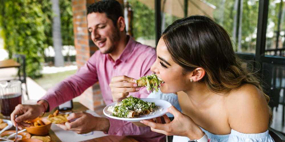 Friends having their favourite food near The View at Wash Park in Denver, Colorado