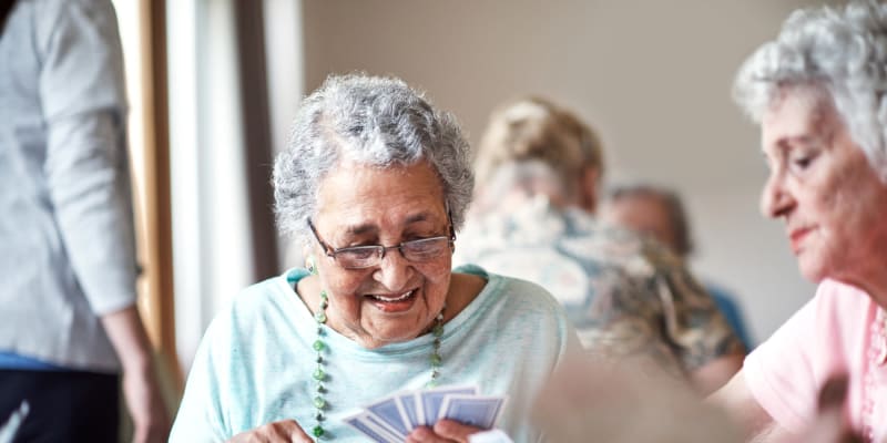 Residents playing cards at The Blake at Biloxi in Biloxi, Mississippi