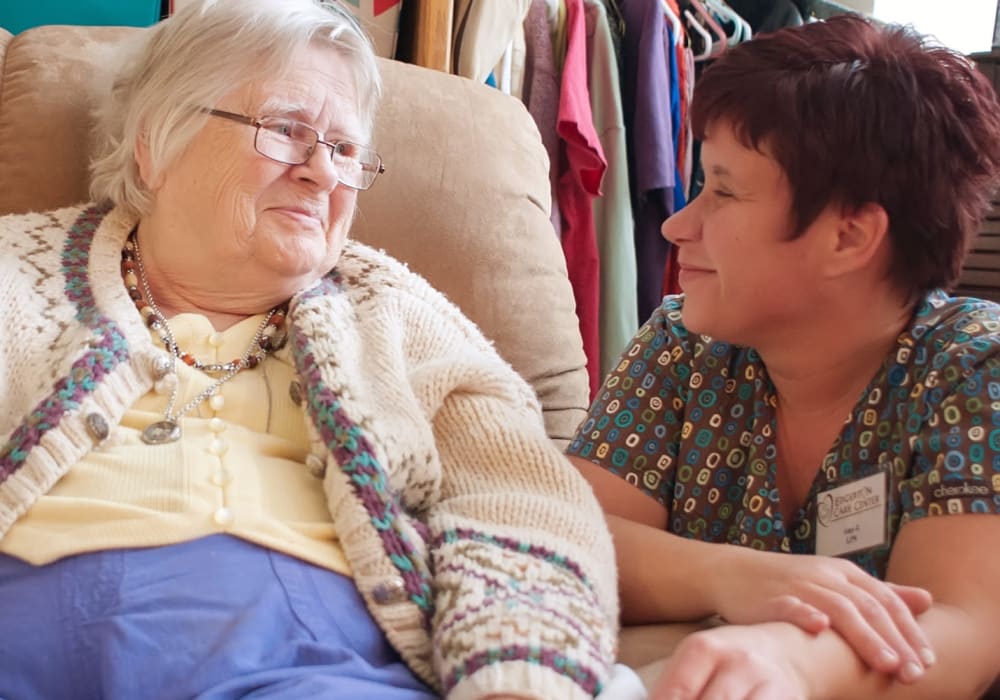 Resident and caretaker relaxing together at Edgerton Care Center in Edgerton, Wisconsin