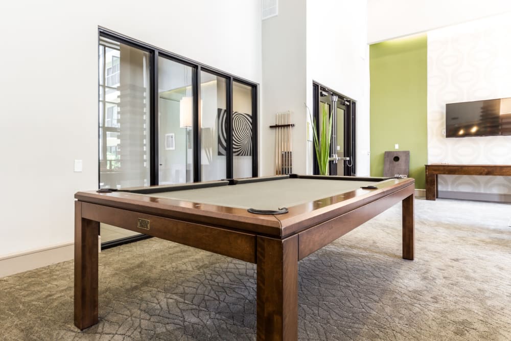 Pool table in game area of community clubhouse at Marq Uptown in Austin, Texas
