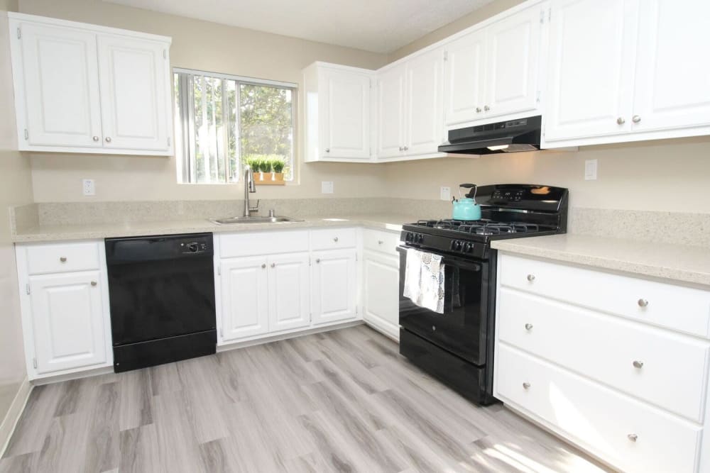 Open-concept kitchen of Country Club Gardens in Sacramento, California